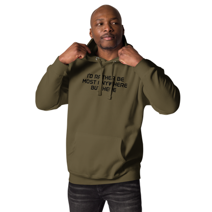 "I’d rather be most anywhere but here" printed on a military green unisex hoodie worn by a male