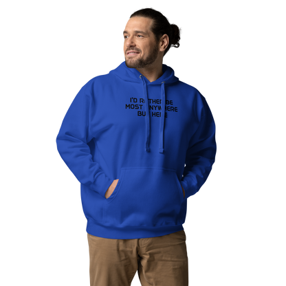 "I’d rather be most anywhere but here" printed on a team royal unisex hoodie worn by a male