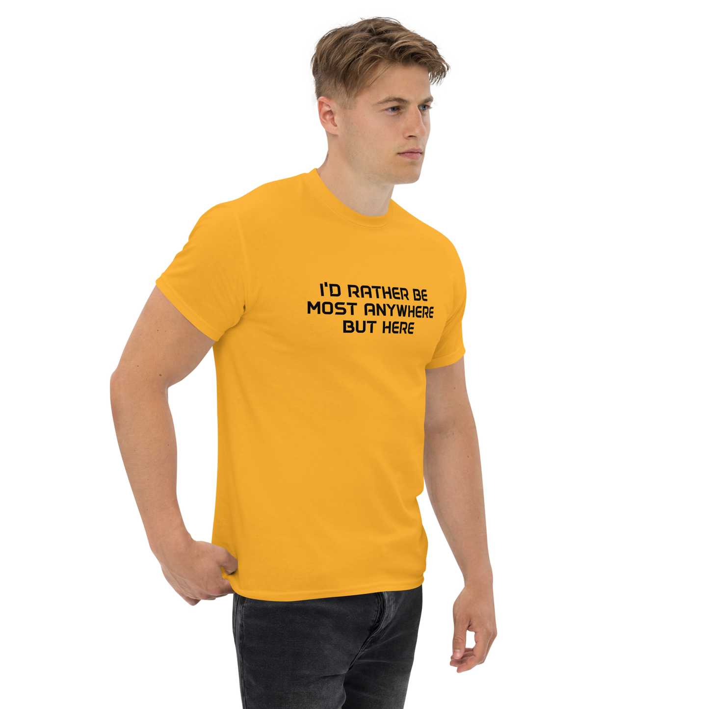 "I’d rather be most anywhere but here" printed on a gold unisex classic tee worn by a male