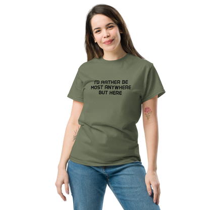"I’d rather be most anywhere but here" printed on a military green unisex classic tee worn by a female