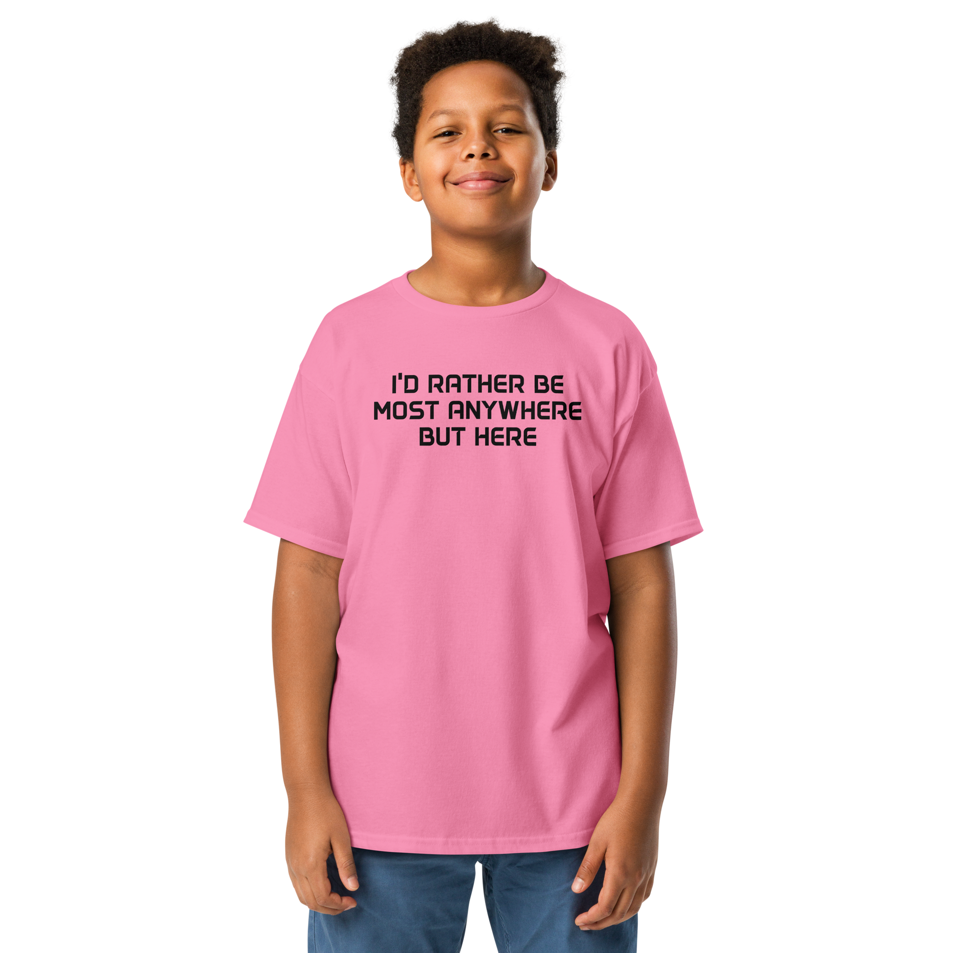"I’d rather be most anywhere but here" printed on a azalea youth classic tee worn by a male