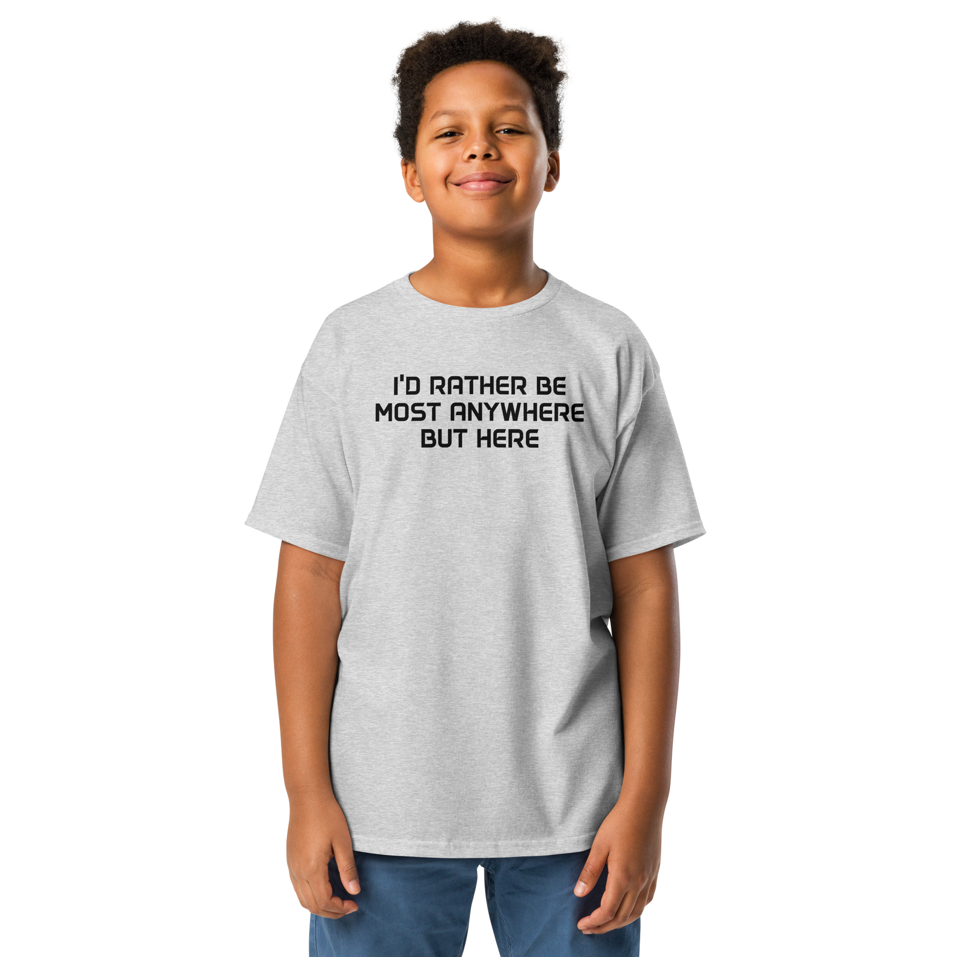 "I’d rather be most anywhere but here" printed on a sport grey youth classic tee worn by a male