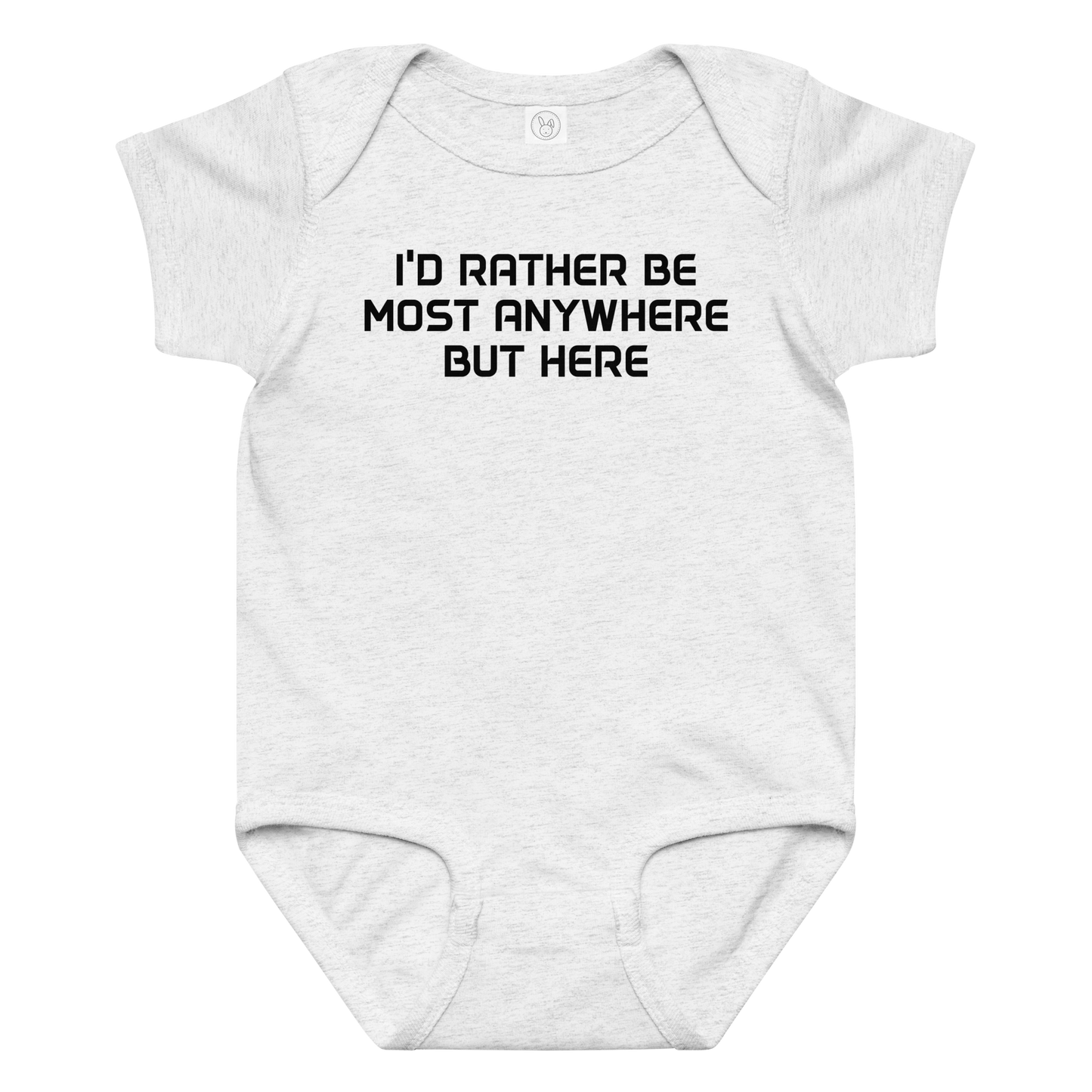 "I’d rather be most anywhere but here" printed on a ash baby jersey bodysuit laying on a flat surface amongst other clothes
