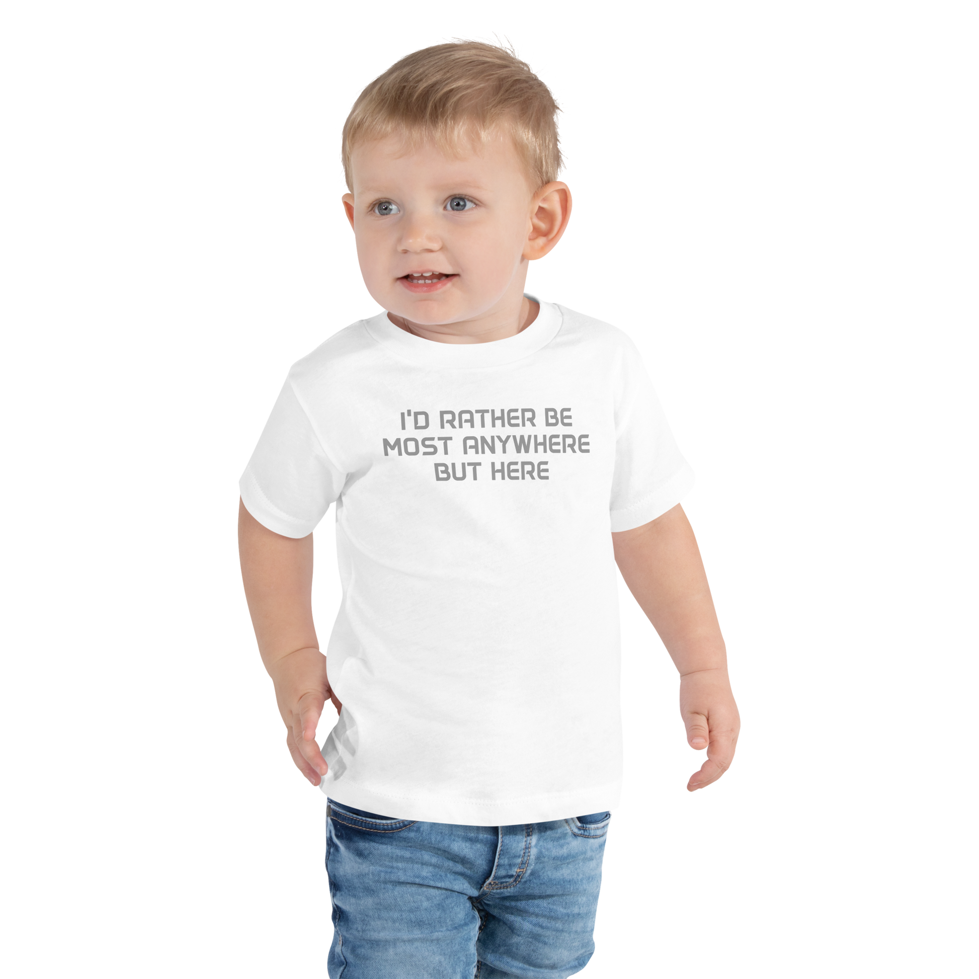 "I’d rather be most anywhere but here" printed on a white toddler short sleeve tee worn by a male