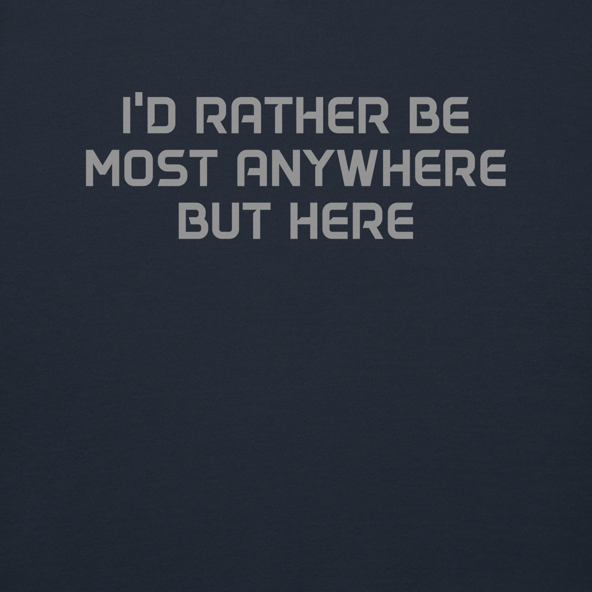 "I’d rather be most anywhere but here" printed on a navy blazer background