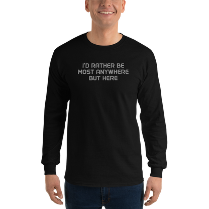 "I’d rather be most anywhere but here" printed on a black men's long sleeve shirt worn by a male