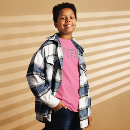 "I’d rather be most anywhere but here" printed on a azalea youth classic tee worn by a male also wearing a jacket