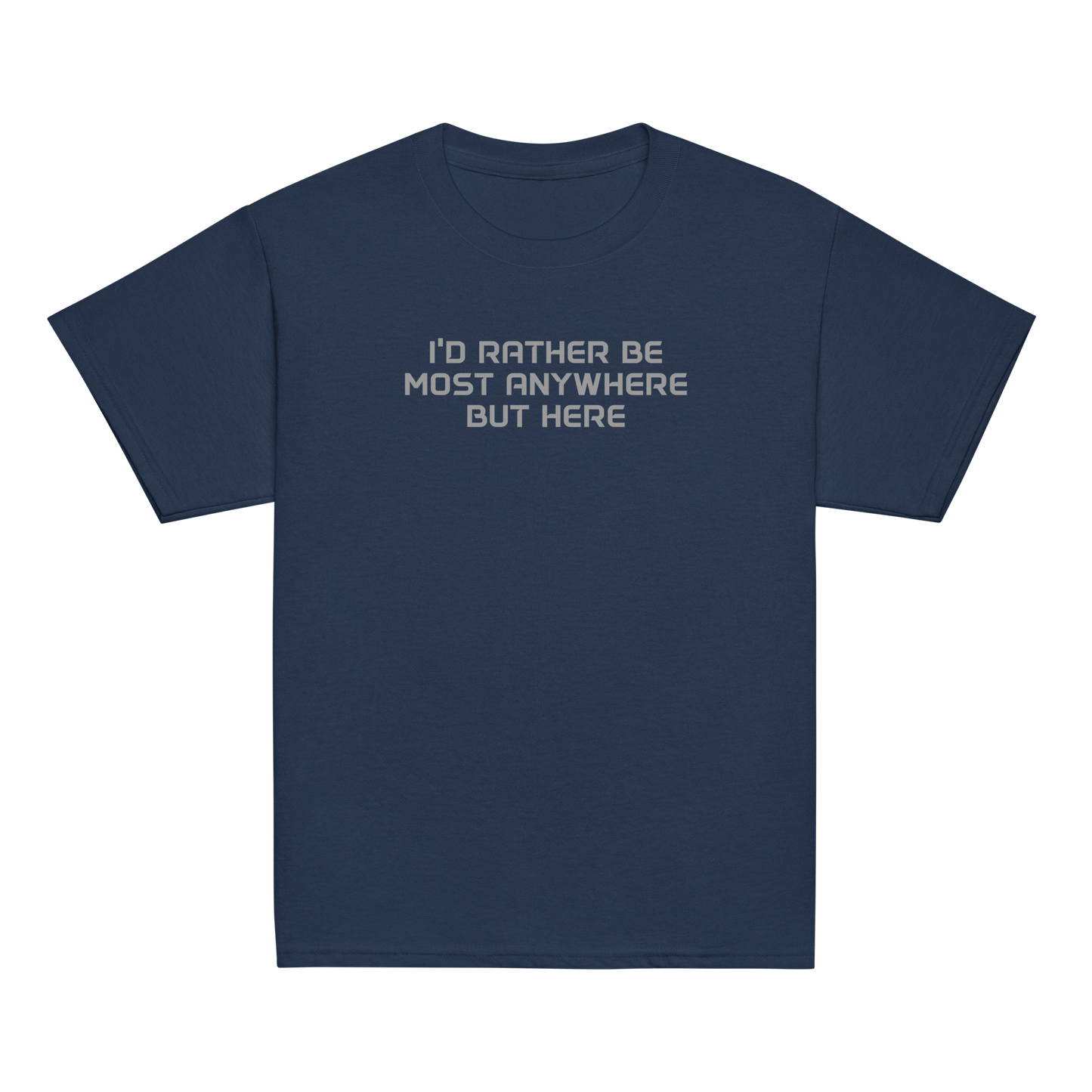 "I’d rather be most anywhere but here" printed on a navy youth classic tee laying on a flat surface