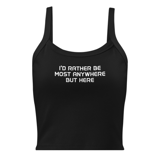 "I’d rather be most anywhere but here" printed on a solid black blend women's micro-rib tanktop laying on a flat surface
