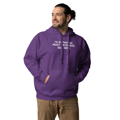"I’d rather be most anywhere but here" printed on a purple unisex hoodie worn by a male
