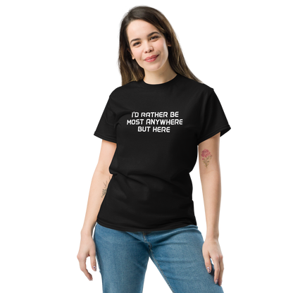 "I’d rather be most anywhere but here" printed on a black unisex classic tee worn by a female