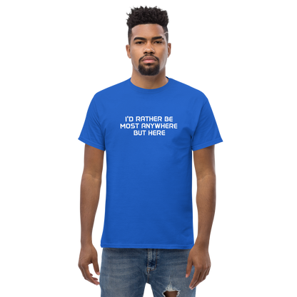 "I’d rather be most anywhere but here" printed on a royal unisex classic tee worn by a male