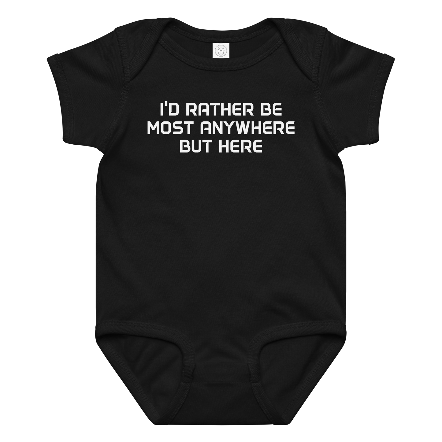 "I’d rather be most anywhere but here" printed on a black baby jersey bodysuit laying on a flat surface amongst other clothes
