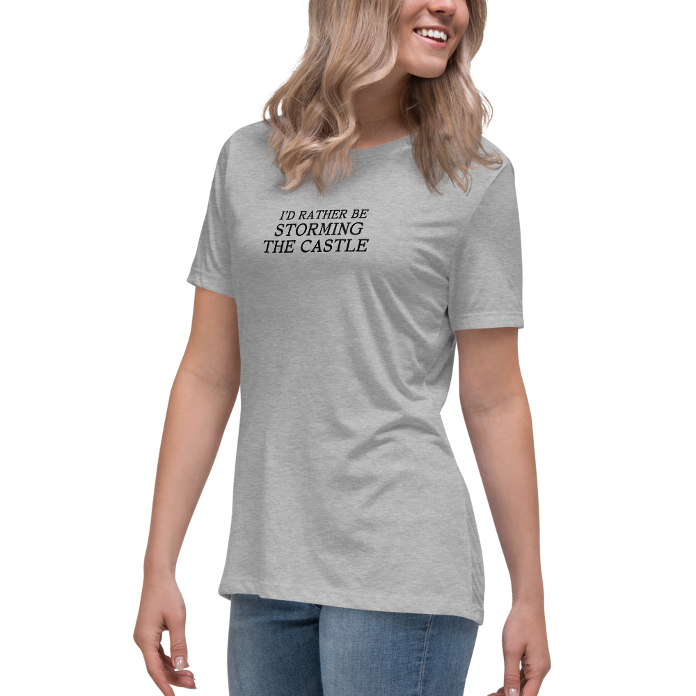 "I'd rather be storming the castle" printed on a athletic heather women's relaxed t-shirt worn by a female