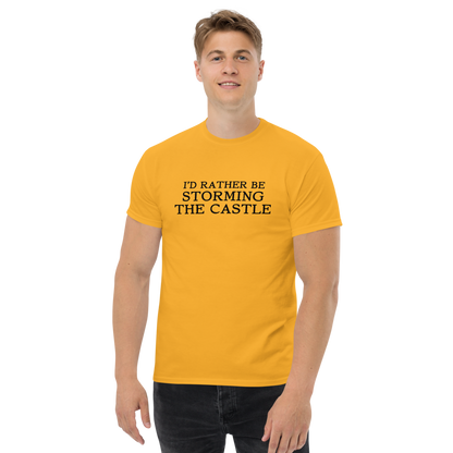 "I'd rather be storming the castle" printed on a gold unisex classic tee worn by a male