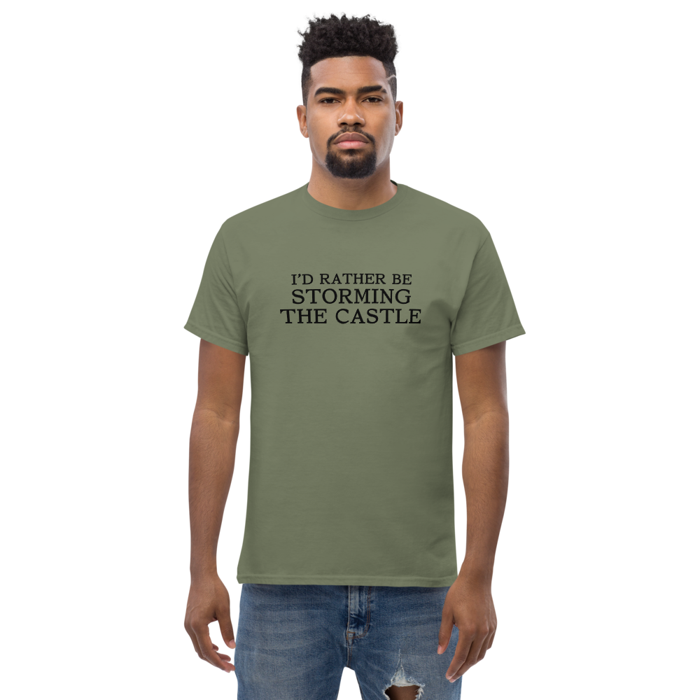 "I'd rather be storming the castle" printed on a military green unisex classic tee worn by a male