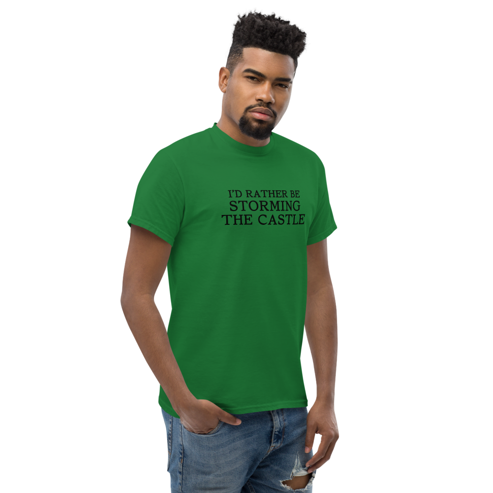 "I'd rather be storming the castle" printed on a turf green unisex classic tee worn by a male