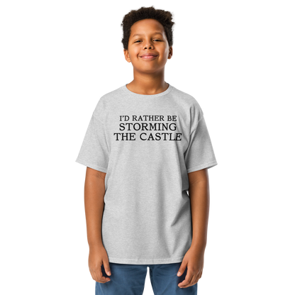 "I'd rather be storming the castle" printed on a sport grey youth classic tee worn by a male