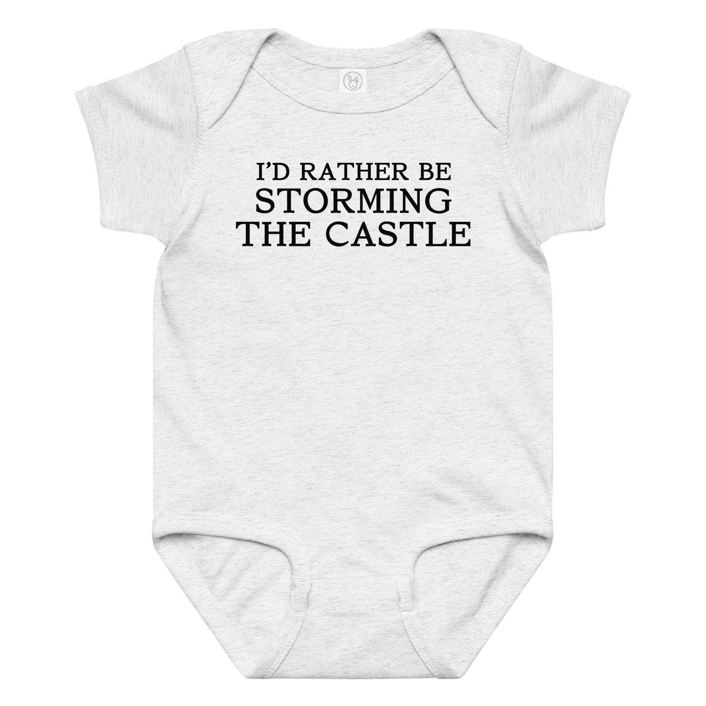 "I'd rather be storming the castle" printed on a ash baby jersey bodysuit laying on a flat surface amongst other clothes