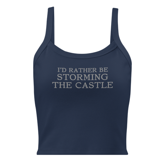 "I'd rather be storming the castle" printed on a solid navy blend women's micro-rib tanktop laying on a flat surface