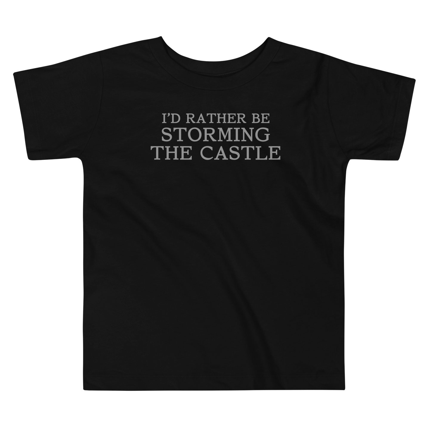"I'd rather be storming the castle" printed on a black toddler short sleeve tee laying on a flat surface