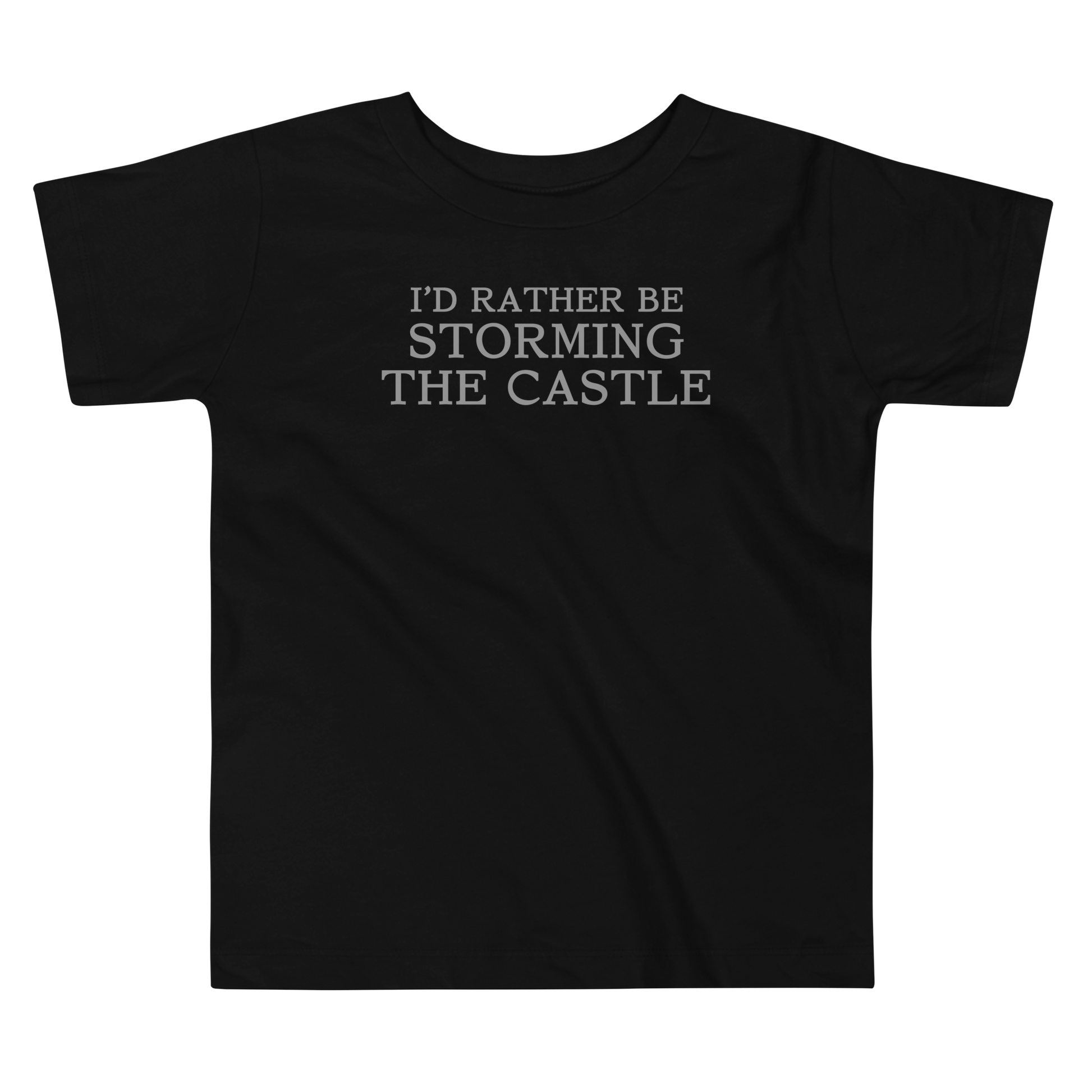 "I'd rather be storming the castle" printed on a black toddler short sleeve tee laying on a flat surface