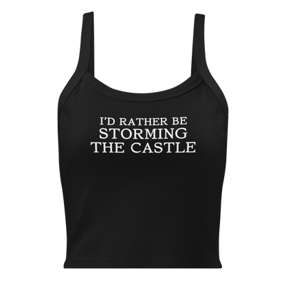 "I'd rather be storming the castle" printed on a solid black blend women's micro-rib tanktop laying on a flat surface