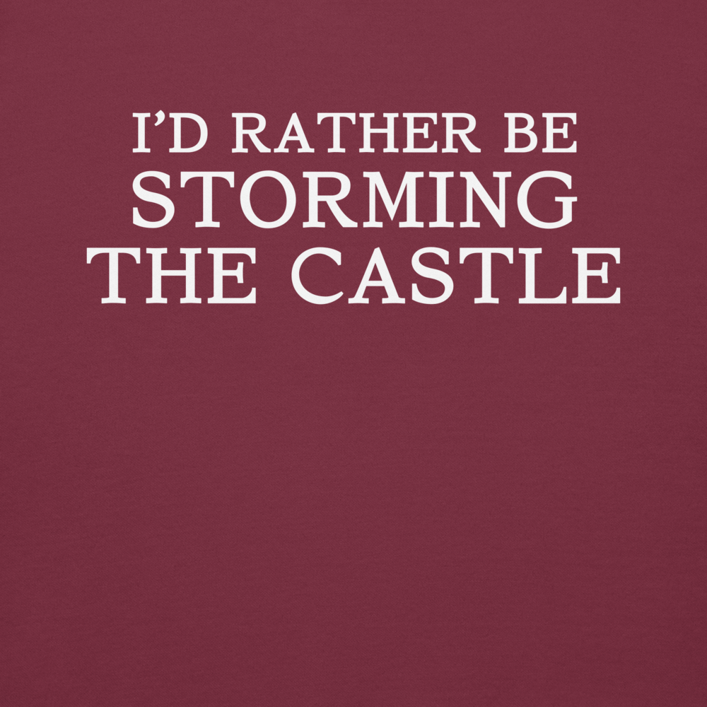 "I'd rather be storming the castle" printed on a maroon background