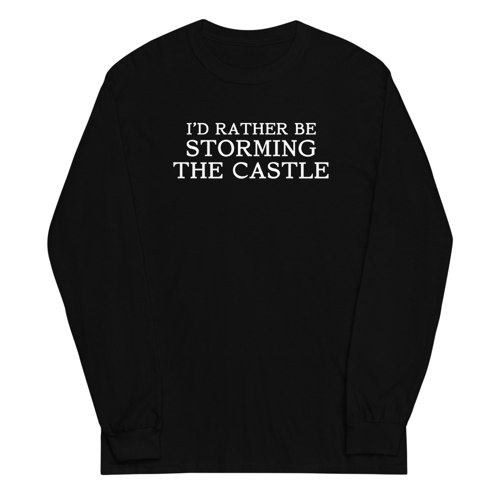 "I'd rather be storming the castle" printed on a black men's long sleeve shirt laying on a flat surface