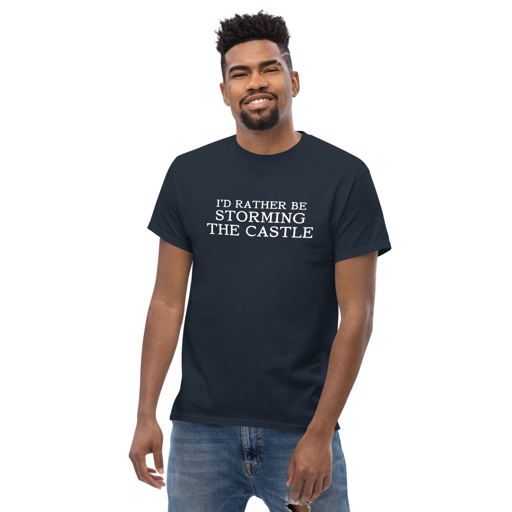 "I'd rather be storming the castle" printed on a navy unisex classic tee worn by a male