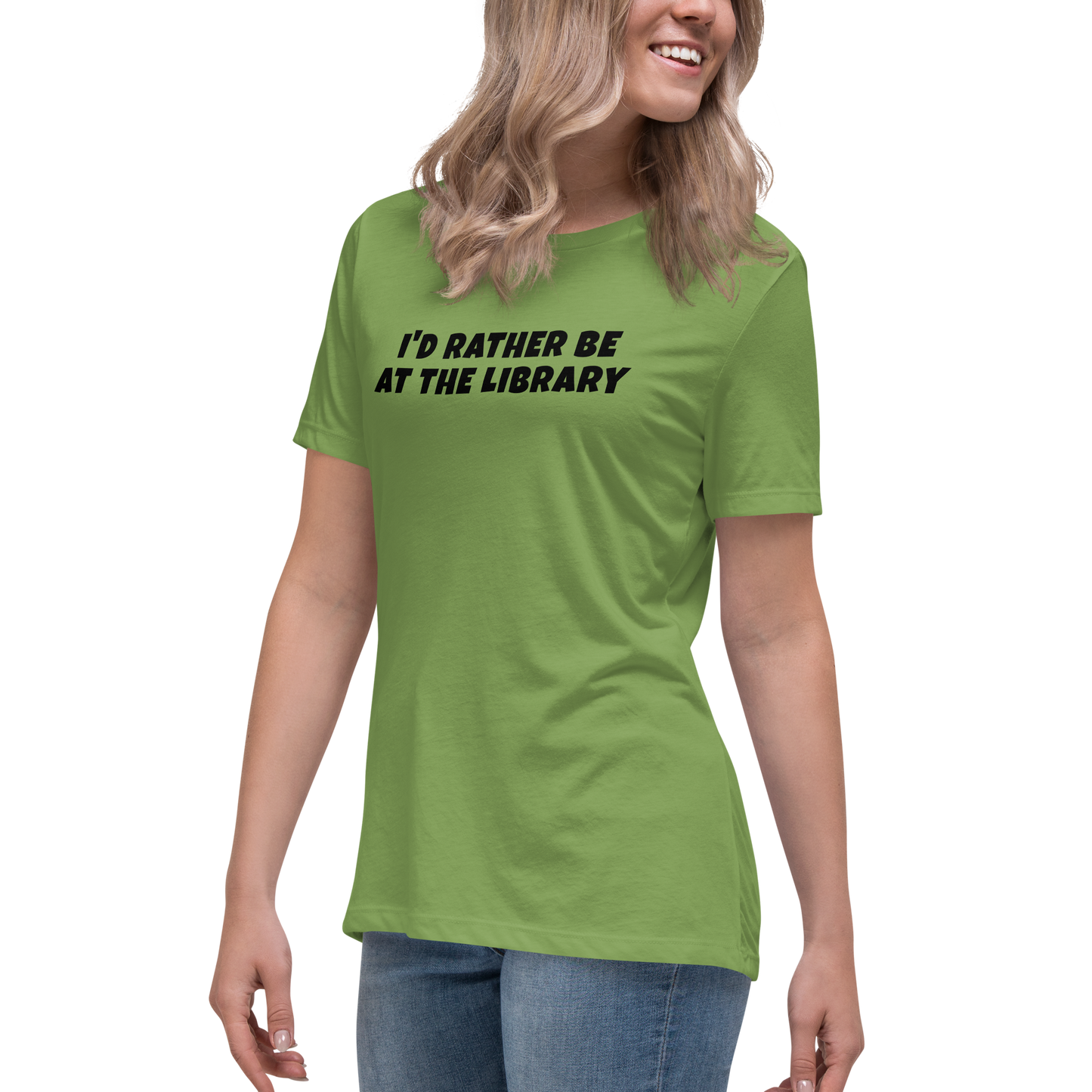 "I’d rather be at the library" printed on a leaf women's relaxed t-shirt worn by a female