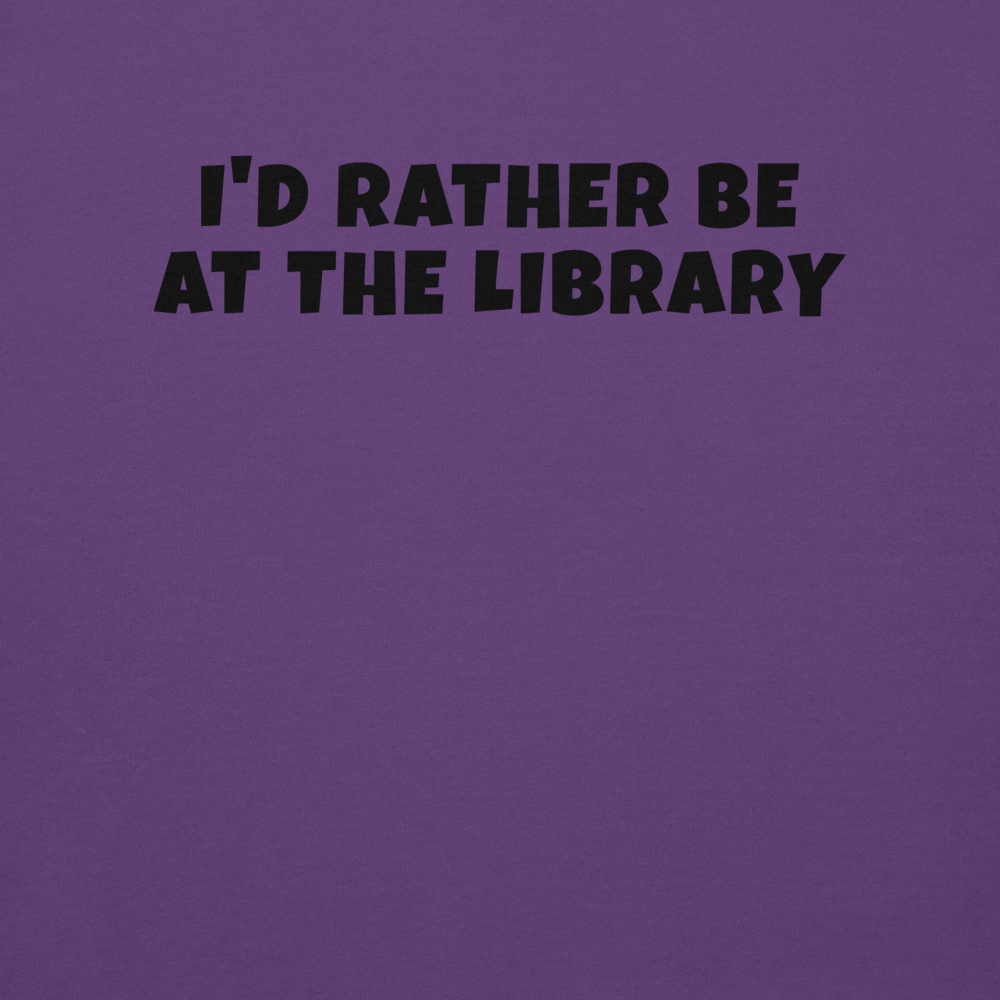 "I’d rather be at the library" printed on a purple background