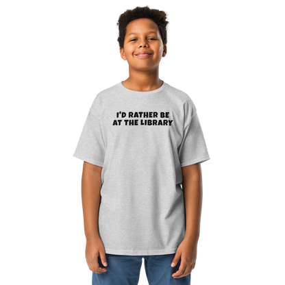 "I’d rather be at the library" printed on a sport grey youth classic tee worn by a male