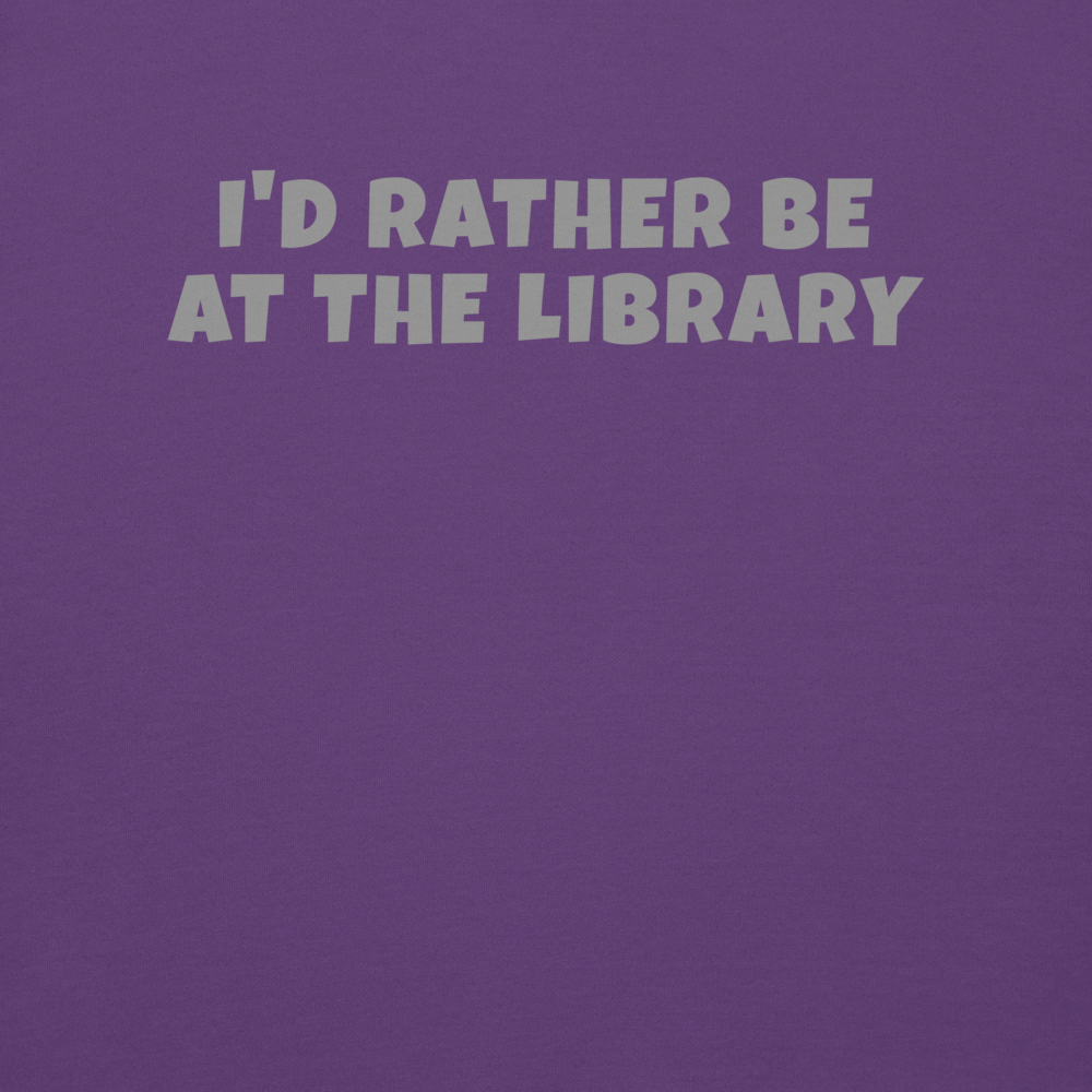 "I’d rather be at the library" printed on a purple background