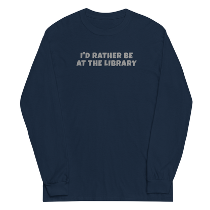 "I’d rather be at the library" printed on a navy men's long sleeve shirt laying on a flat surface
