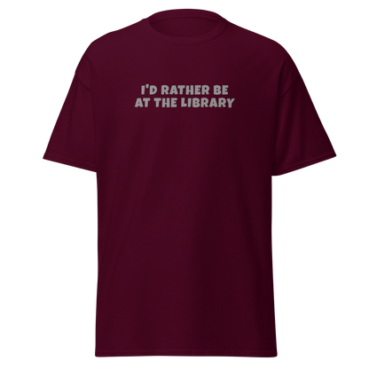 "I’d rather be at the library" printed on a maroon on an invisible body