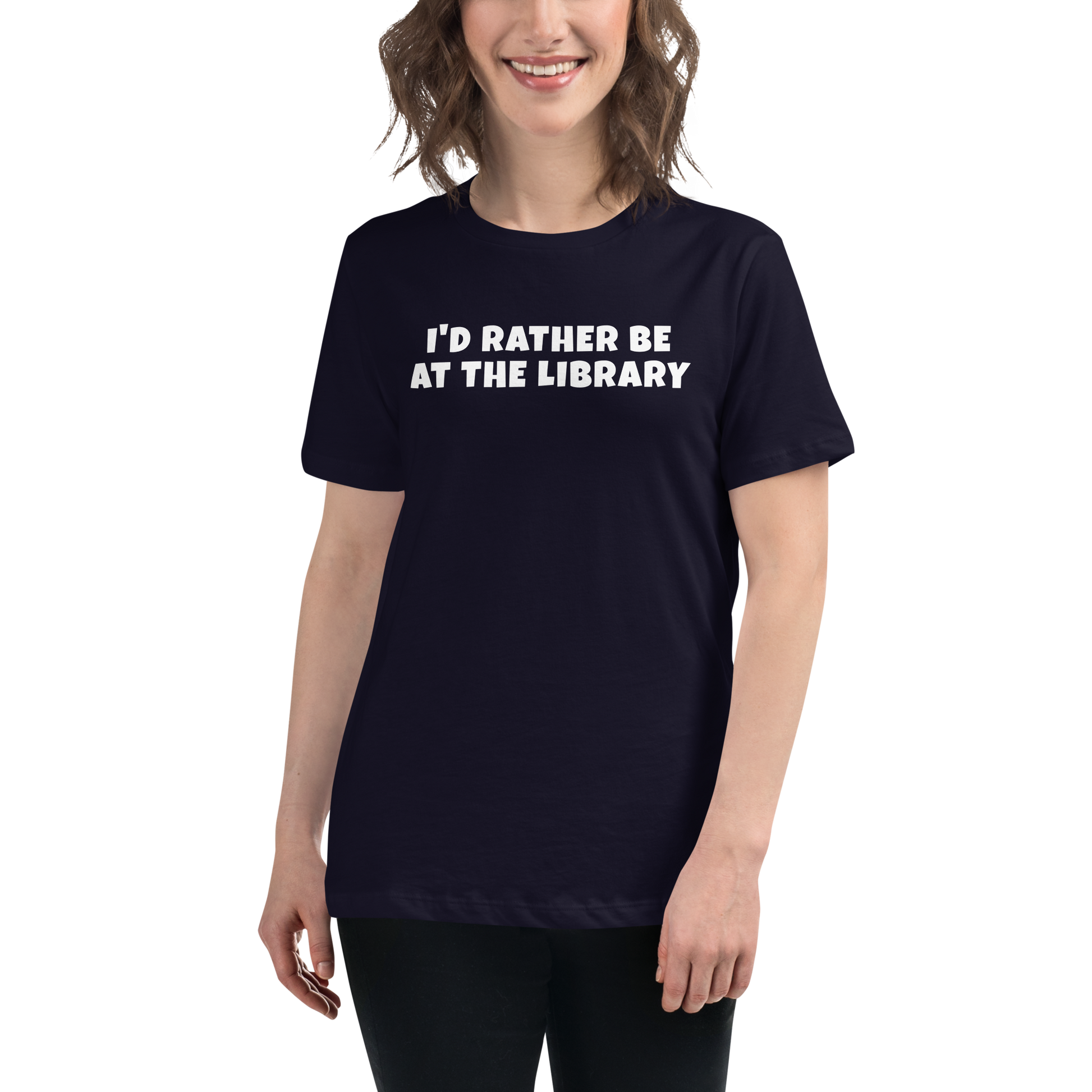 "I’d rather be at the library" printed on a navy women's relaxed t-shirt worn by a female