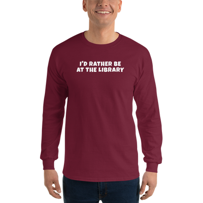 "I’d rather be at the library" printed on a maroon men's long sleeve shirt worn by a male