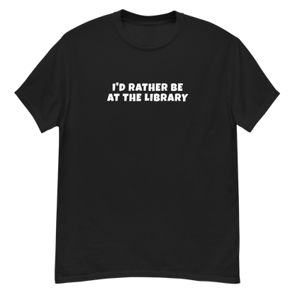 "I’d rather be at the library" printed on a black unisex classic tee laying on a flat surface