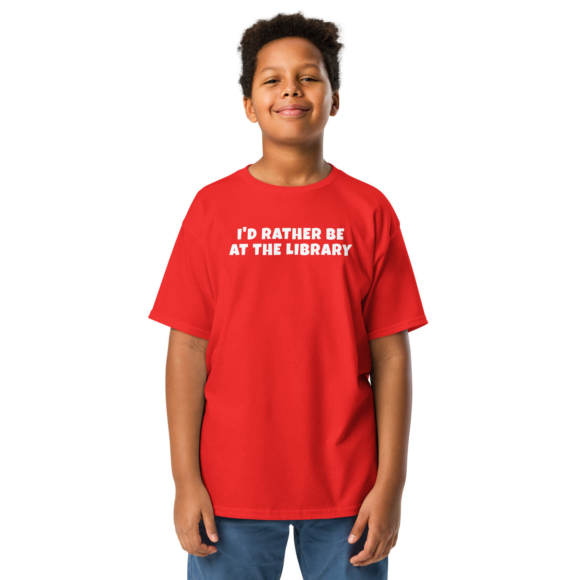"I’d rather be at the library" printed on a red youth classic tee worn by a male