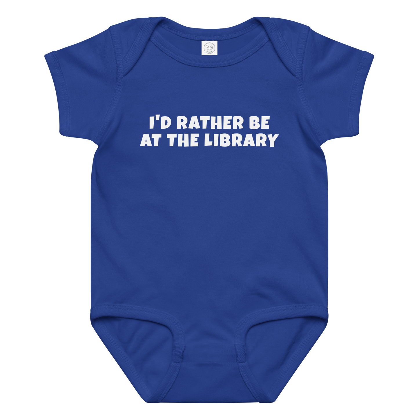 "I’d rather be at the library" printed on a royal baby jersey bodysuit laying on a flat surface amongst other clothes
