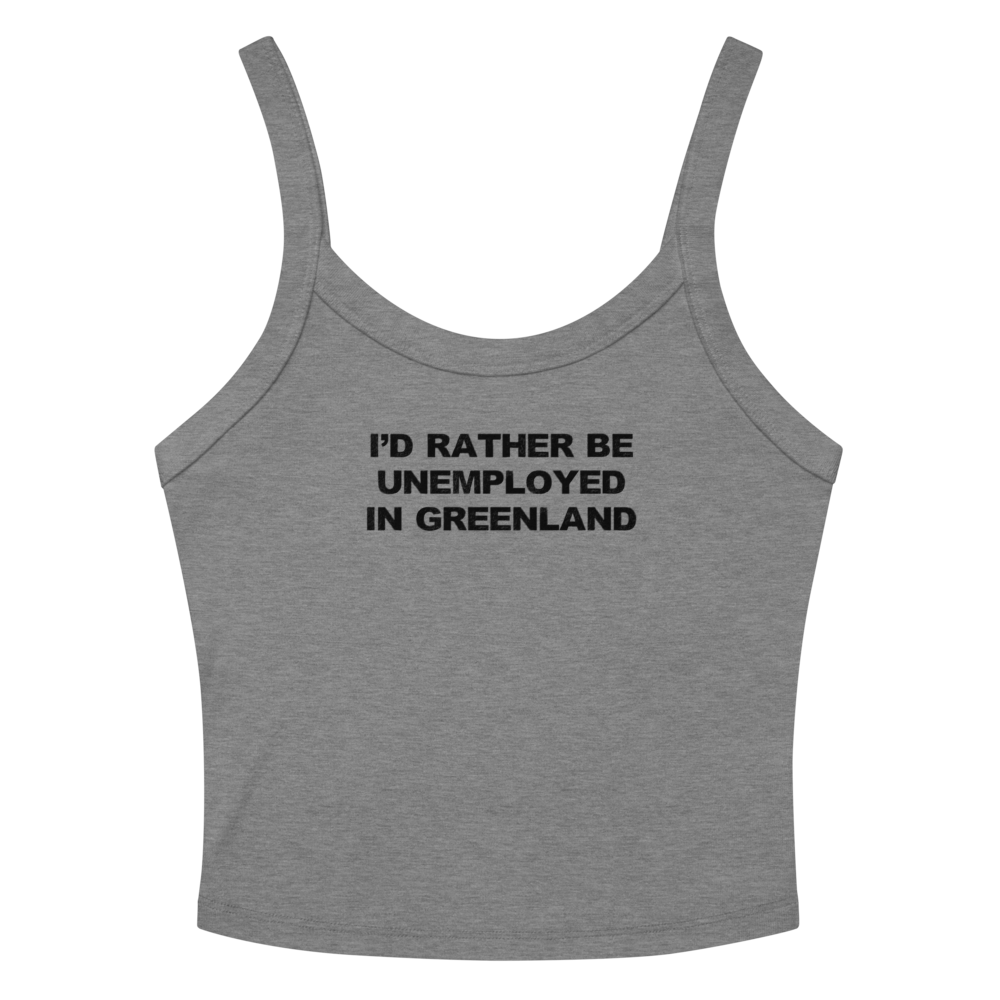 "I'd rather be unemployed in greenland" printed on a athletic heather women's micro-rib tanktop laying on a flat surface amongst sunglasses and shorts
