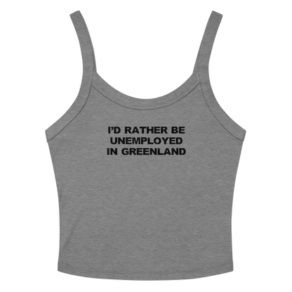 "I'd rather be unemployed in greenland" printed on a athletic heather women's micro-rib tanktop laying on a flat surface amongst sunglasses and shorts