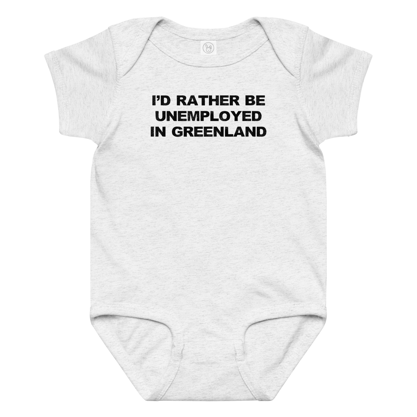 "I'd rather be unemployed in greenland" printed on a ash baby jersey bodysuit laying on a flat surface amongst other clothes