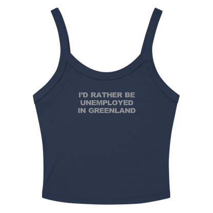 "I'd rather be unemployed in greenland" printed on a solid navy blend women's micro-rib tanktop laying on a flat surface amongst sunglasses and shorts