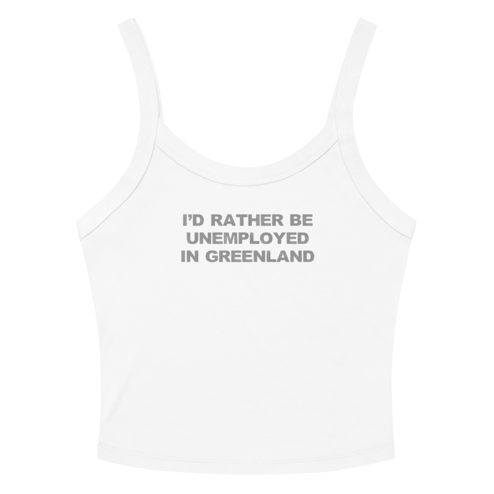 "I'd rather be unemployed in greenland" printed on a solid white blend women's micro-rib tanktop laying on a flat surface amongst sunglasses and shorts