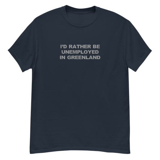 "I'd rather be unemployed in greenland" printed on a navy unisex classic tee laying on a flat surface