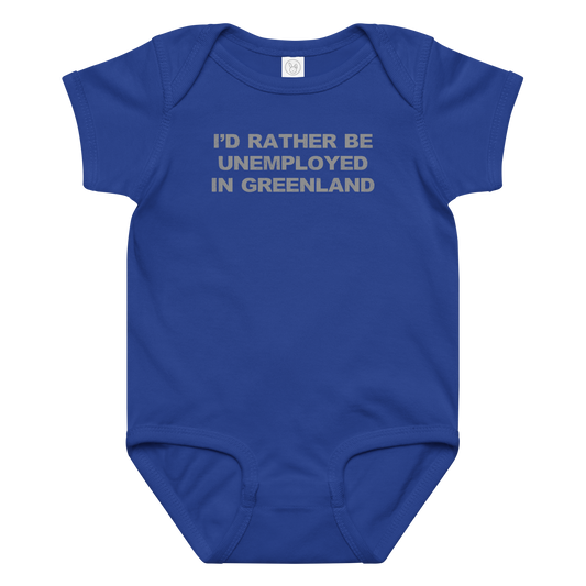 "I'd rather be unemployed in greenland" printed on a royal baby jersey bodysuit laying on a flat surface amongst other clothes