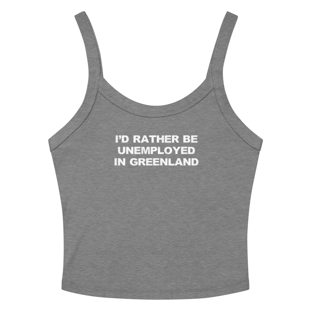 "I'd rather be unemployed in greenland" printed on a athletic heather women's micro-rib tanktop laying on a flat surface amongst sunglasses and shorts
