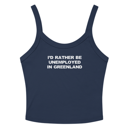 "I'd rather be unemployed in greenland" printed on a solid navy blend women's micro-rib tanktop laying on a flat surface amongst sunglasses and shorts